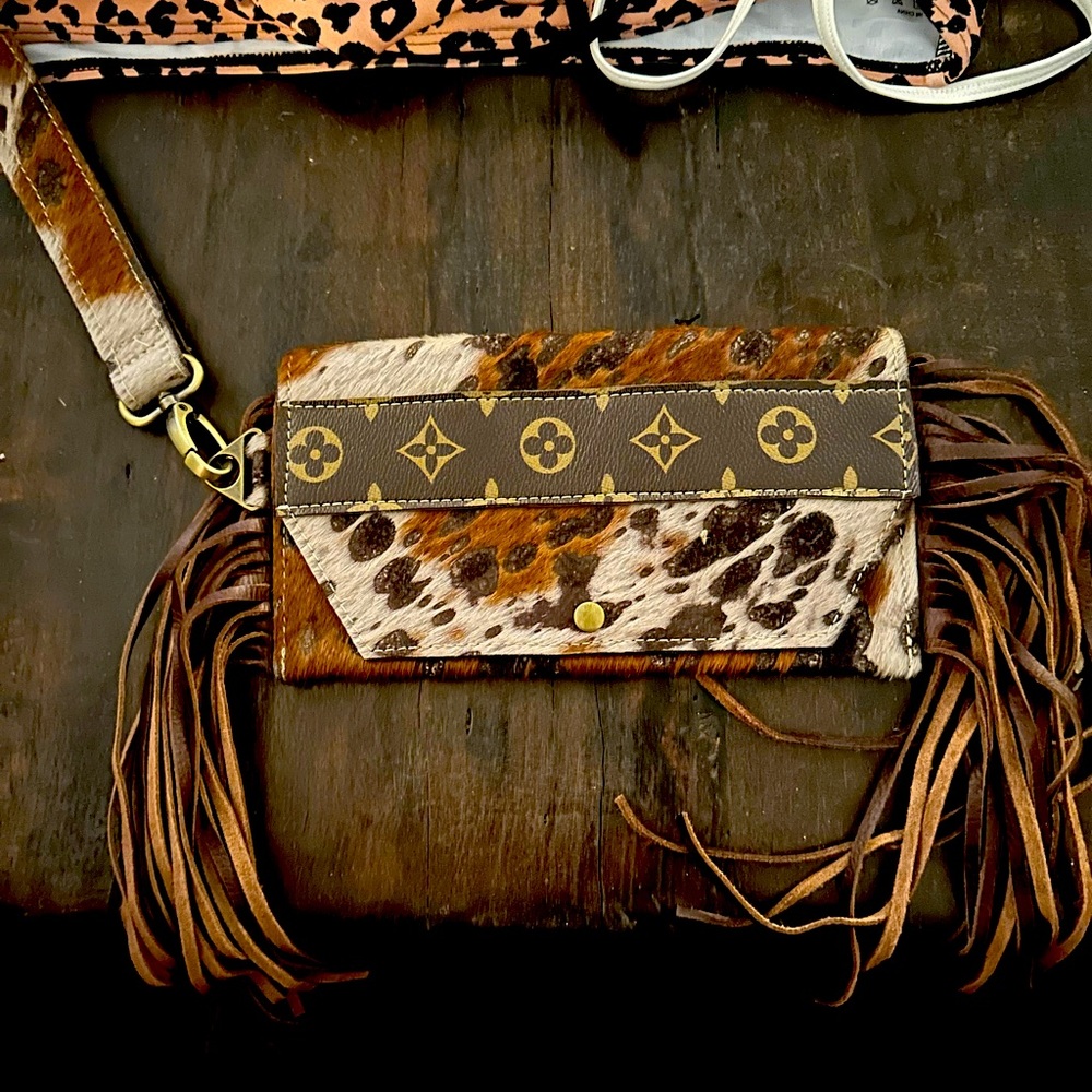 SOLD!! Cow hide wristlet